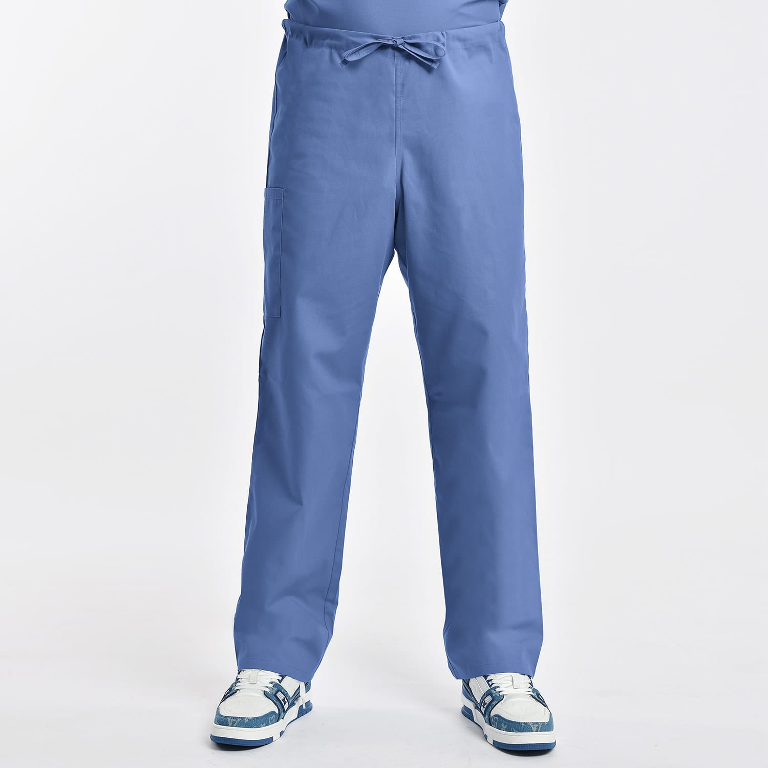 Unisex blue scrub pants with a drawstring waist and side pocket, designed for comfort and durability in medical and healthcare environments.