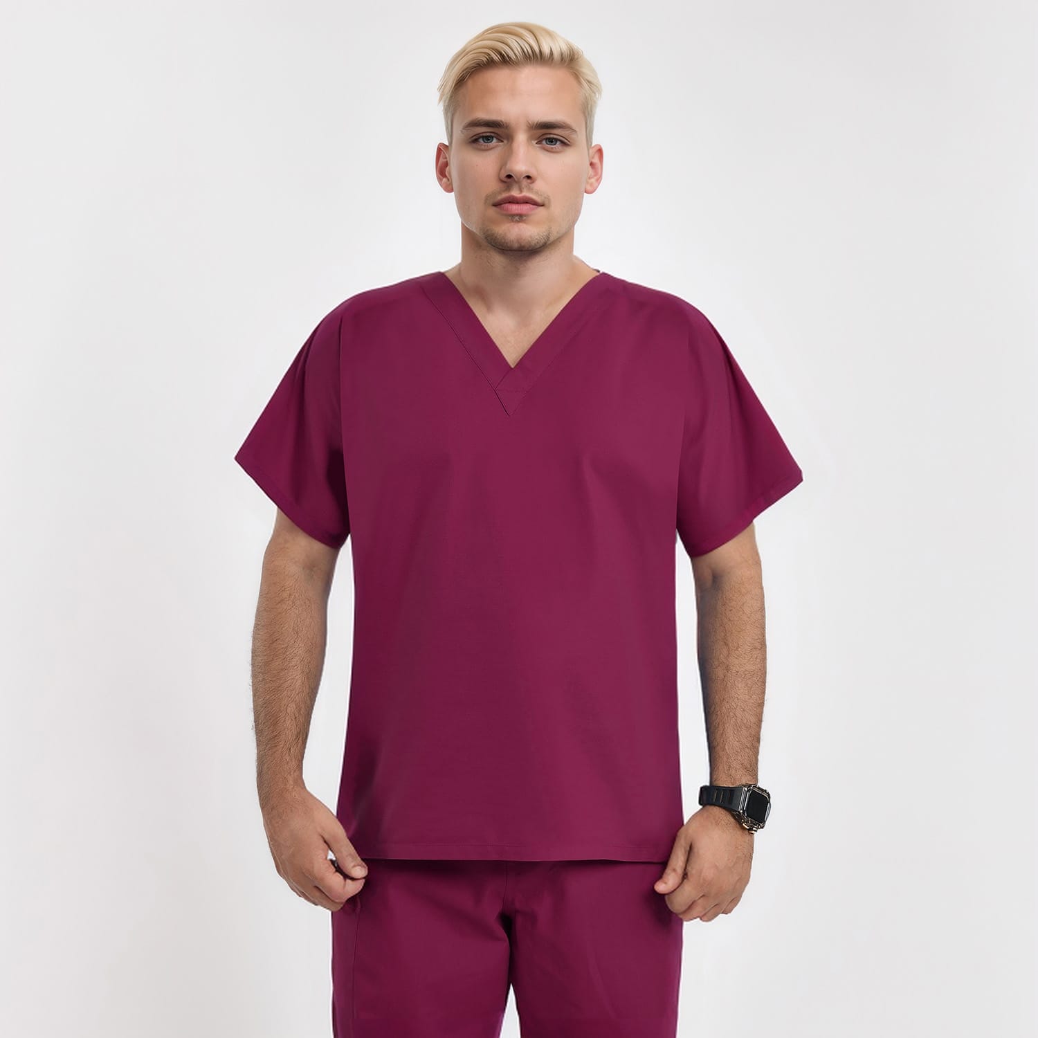 Front view of a male model wearing a burgundy unisex V-neck scrub top, designed for medical professionals seeking comfort and style.