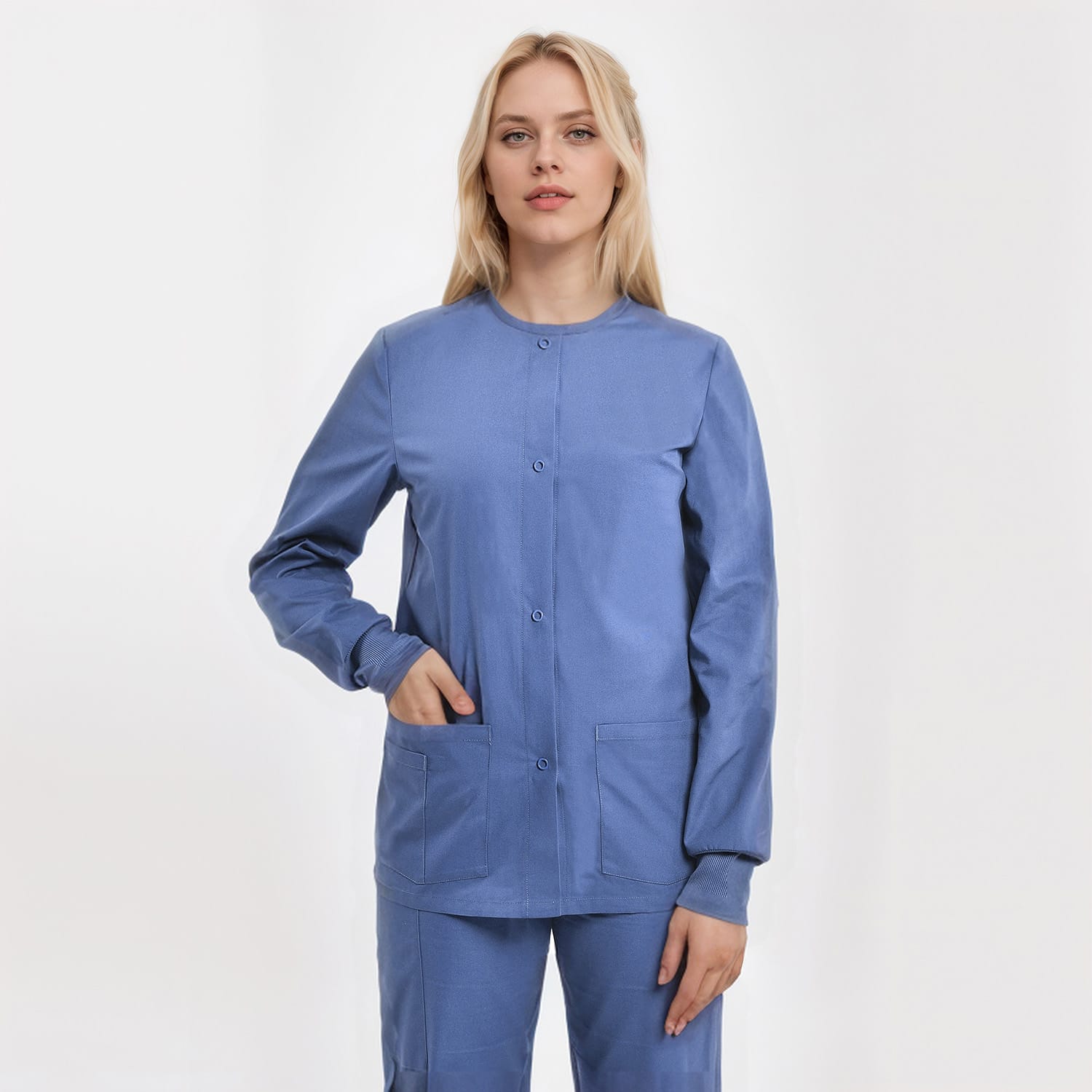 Unisex blue scrub jacket with three pockets, designed for healthcare professionals.