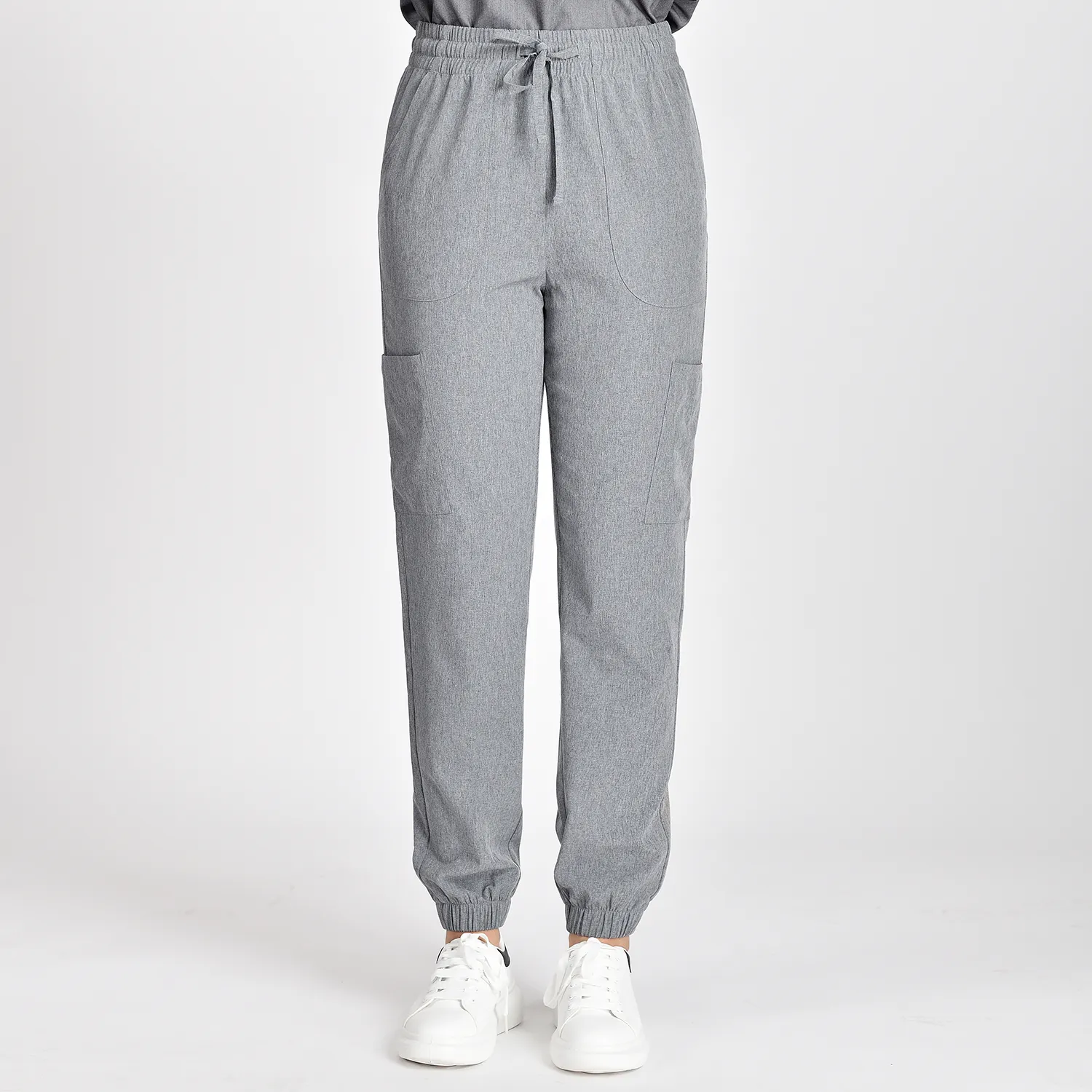 Grey Women’s Medical Scrubs Drawstring Pants with pockets and cuffs, offering comfort and style for healthcare professionals.