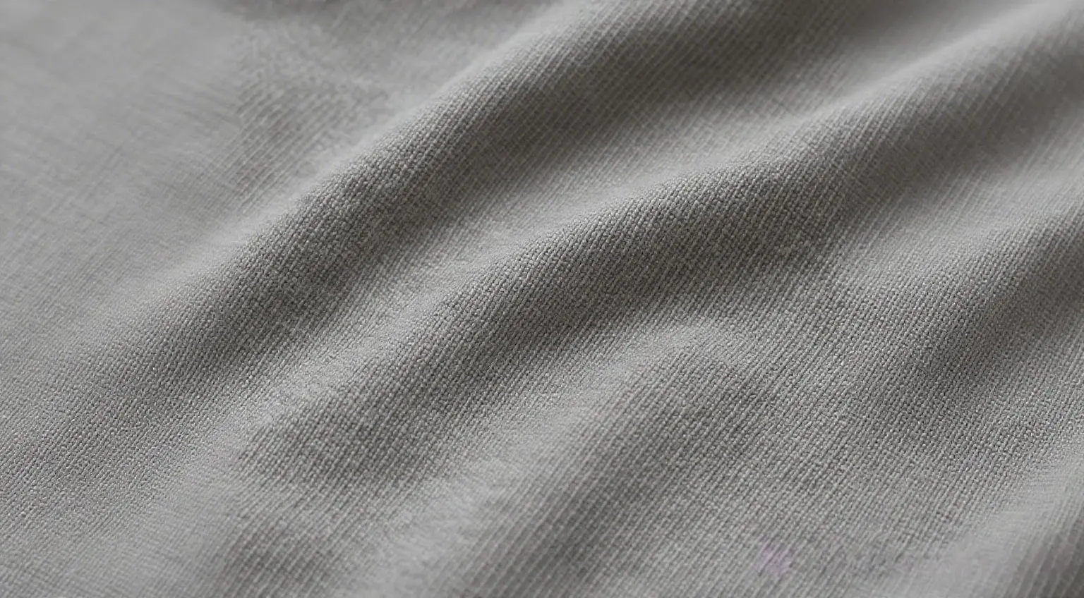 Close-up of cotton scrub fabric showing soft texture and weave